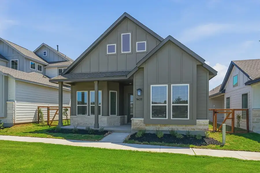 Front exterior of a new home in The Crossvine, Schertz, TX, highlighting curb appeal (Image 2). Front exterior of a new home in The Crossvine, Schertz, TX, highlighting curb appeal (Image 2).