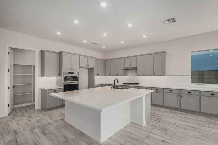 Furnished interior view inside a new home in Valencia at Granite Vista, Waddell (Image 6).