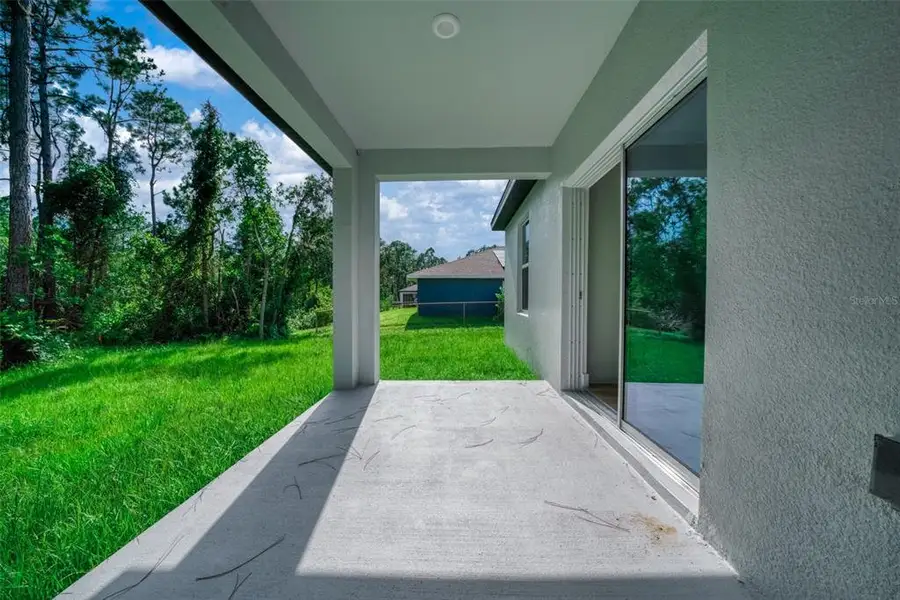 Exterior details and patio area of a home in , Sebring (Image 4). Exterior details and patio area of a home in , Sebring (Image 4).