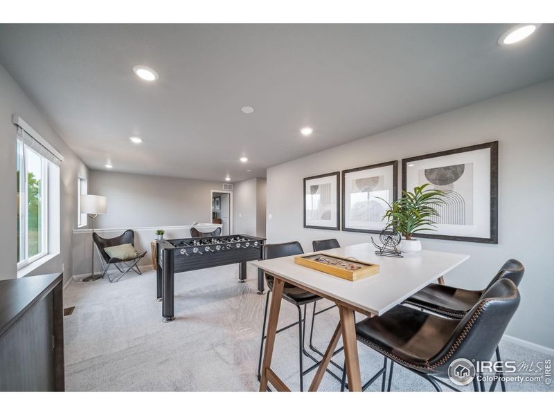 Furnished interior view inside a new home in Thompson River Ranch, Johnstown (Image 40).