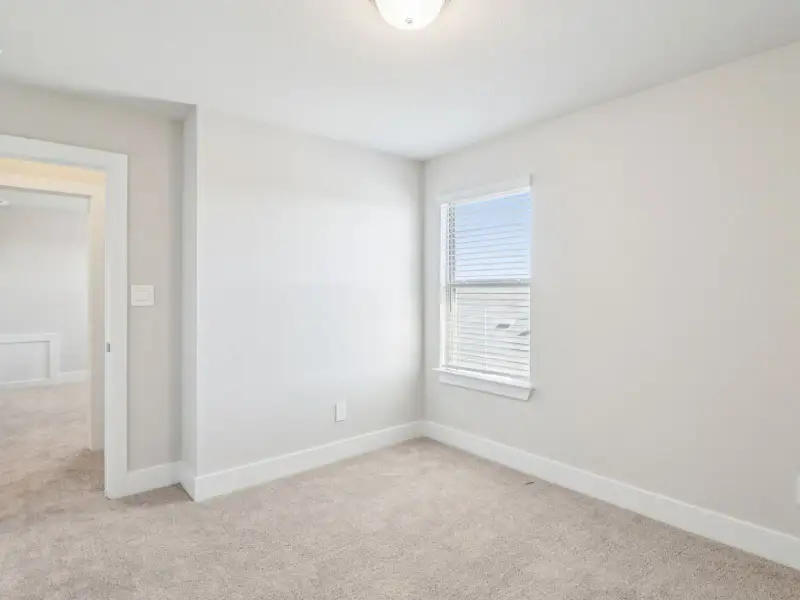 Spacious, unfurnished interior of a new home in Legendary Trails - Premier Series, Cibolo (Image 21).