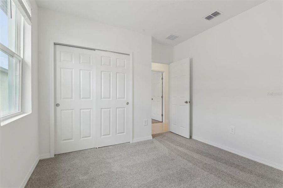 Spacious, unfurnished interior of a new home in Springs at Lake Alfred - Signature Series, Lake Alfred (Image 22).