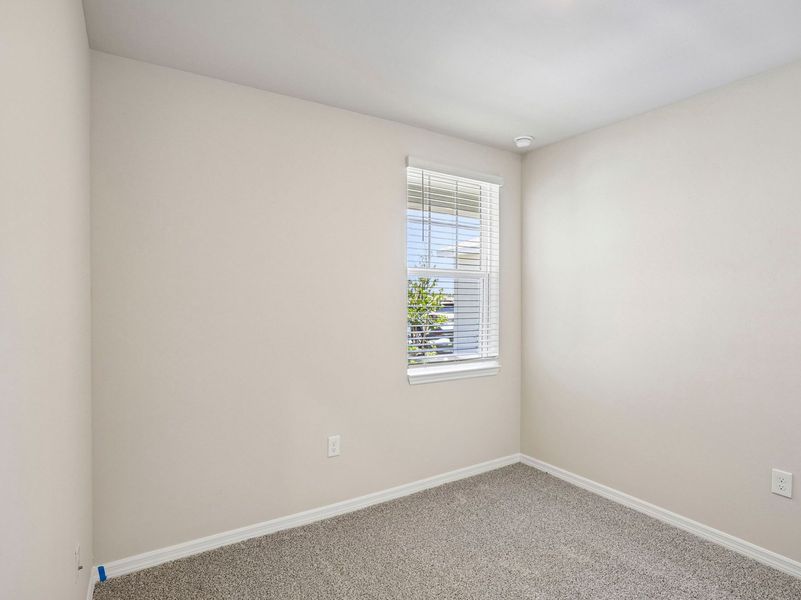 Spacious, unfurnished interior of a new home in Crescent Lakes - Premier Series, Punta Gorda (Image 18).
