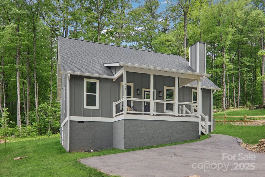 Exterior details and patio area of a home in , Maggie Valley (Image 3).