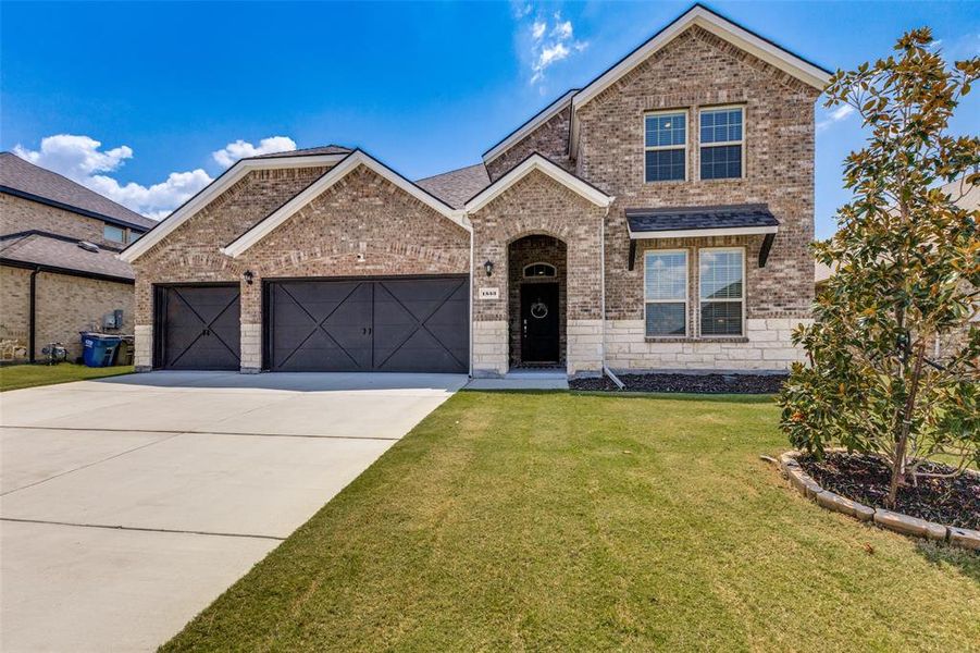 Front exterior of a new home in , Little Elm, TX, highlighting curb appeal (Image 1). Front exterior of a new home in , Little Elm, TX, highlighting curb appeal (Image 1).