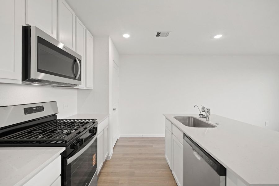 Furnished interior view inside a new home in Sunterra Lakes, Brookshire (Image 4).