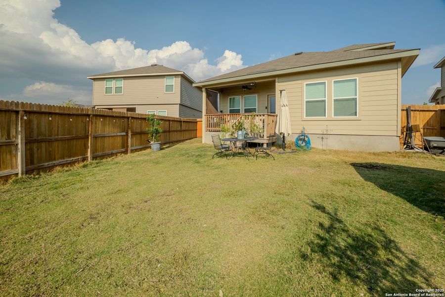 Exterior details and patio area of a home in The Links at River Bend, Floresville (Image 23).