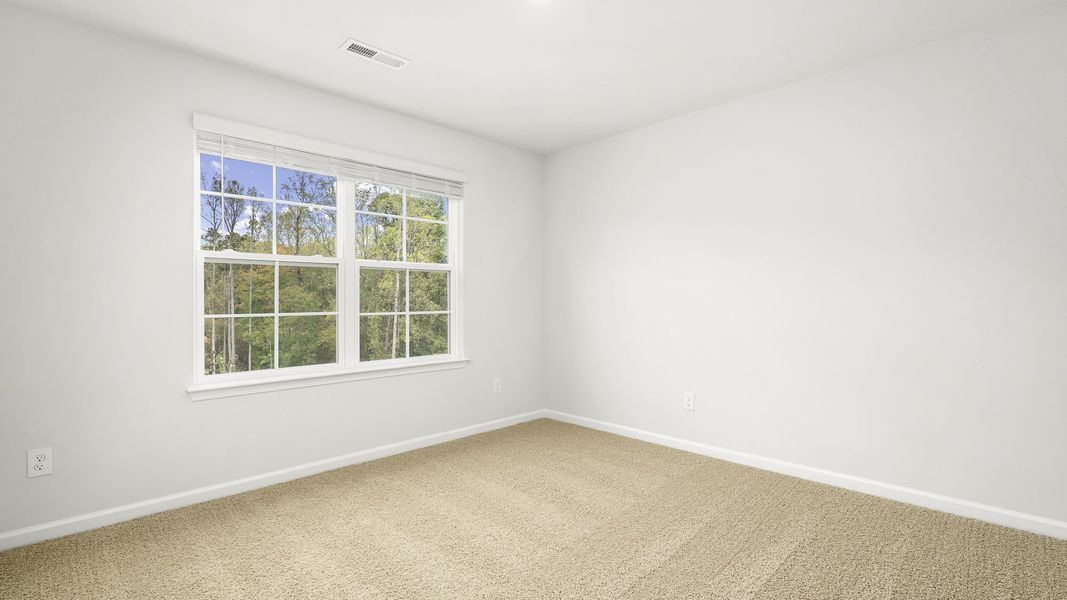 Spacious, unfurnished interior of a new home in Greystone North, Stoneville (Image 12).
