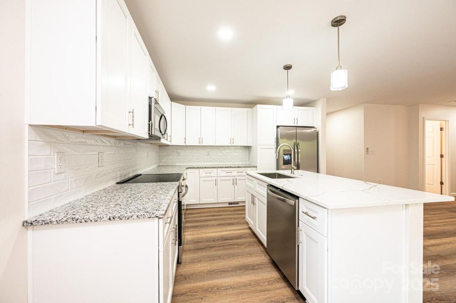 Furnished interior view inside a new home in , Hickory (Image 13).