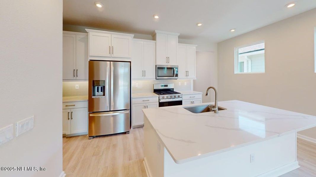 Furnished interior view inside a new home in RiverTown - WaterSong, St. Johns (Image 8).