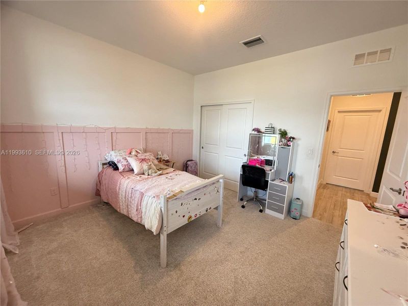 Furnished interior view inside a new home in Tradition, Port St. Lucie (Image 34).