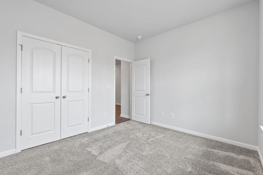 A room with white doors.