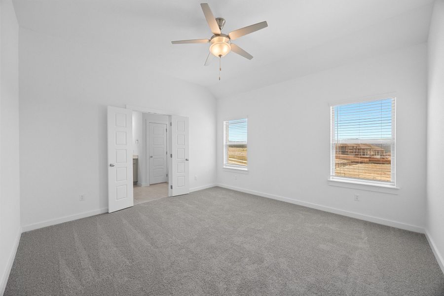 Primary Suite in the Pecan II home plan by Trophy Signature Homes – REPRESENTATIVE PHOTO