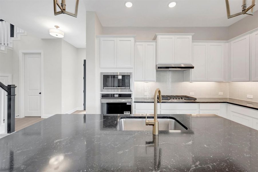 Furnished interior view inside a new home in Pomona - Grove Row Collection, Manvel (Image 6).