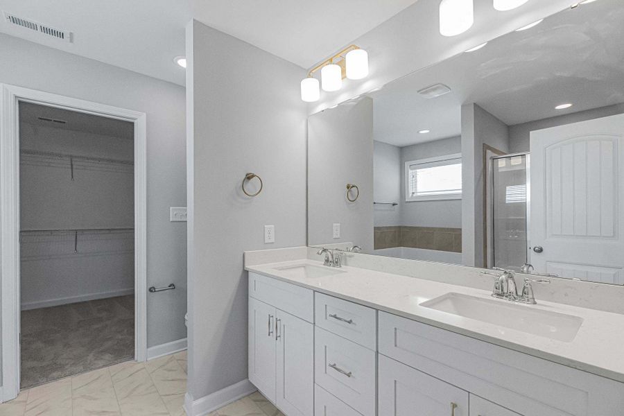Representative furnished interior of a home built from the Drayton by Caviness & Cates Communities in Bartlett Manor, Youngsville (Image 229).