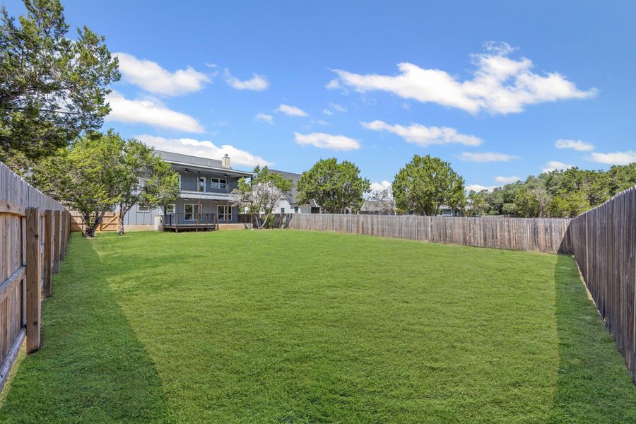 Fenced backyard with a deck Fenced backyard with a deck