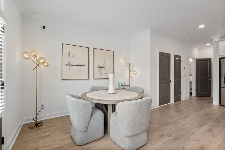 Representative furnished interior of a home built from the The Oleander by The Providence Group in Market Square at Sawnee Village, Cumming (Image 23).