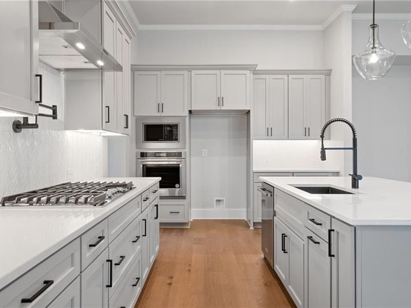 Furnished interior view inside a new home in The Village at Towne Lake, Woodstock (Image 4).