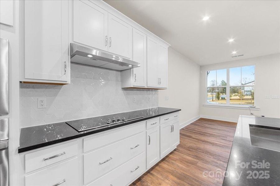 Moody Dark Quartz Countertops.