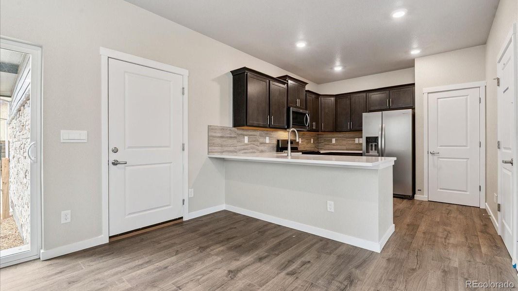 Furnished interior view inside a new home in Horizon Uptown, Aurora (Image 7).