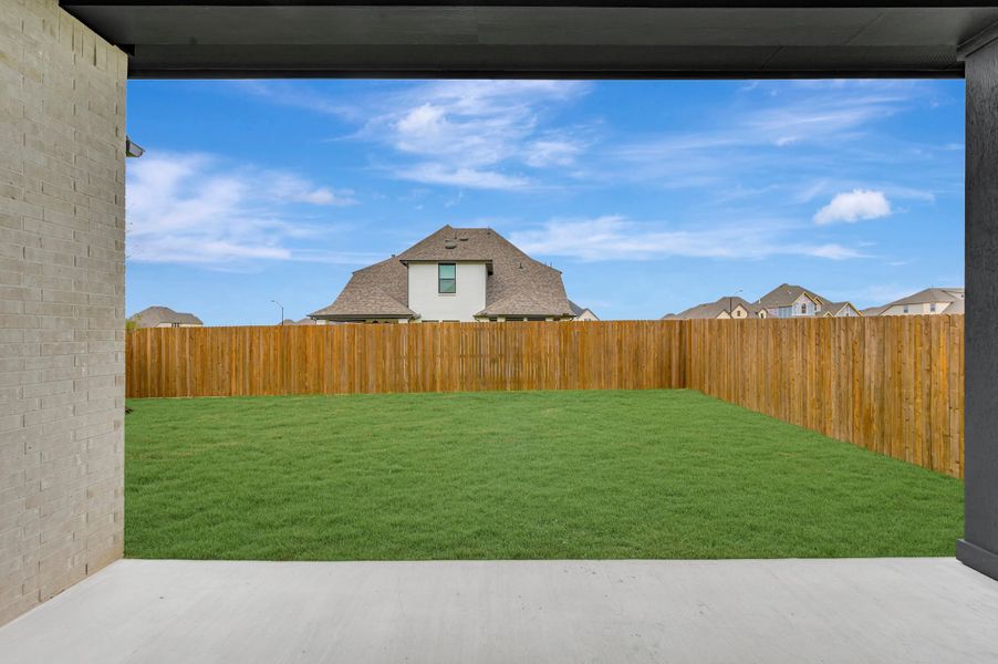 Exterior details and patio area of a home in Tavolo Park Cottages, Fort Worth (Image 4).