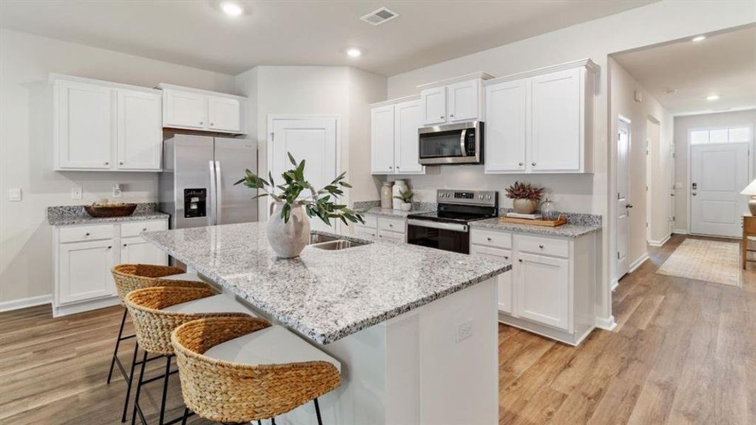 Furnished interior view inside a new home in The Landing at Hidden Lakes, McKinney (Image 9). Furnished interior view inside a new home in The Landing at Hidden Lakes, McKinney (Image 9).