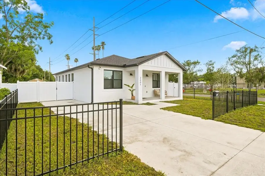 Front exterior of a new home in , Tampa, FL, highlighting curb appeal (Image 1). Front exterior of a new home in , Tampa, FL, highlighting curb appeal (Image 1).