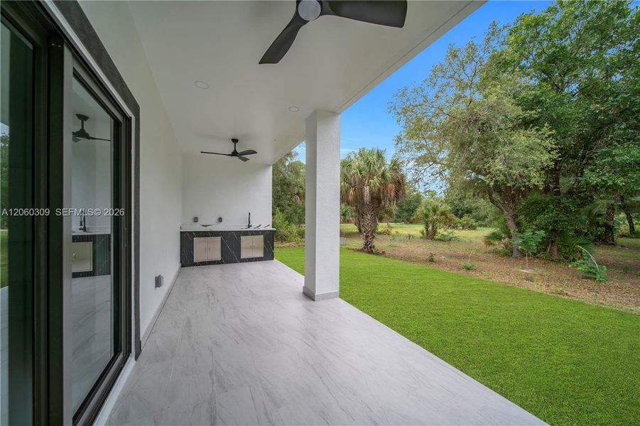 Exterior details and patio area of a home in , Lehigh Acres (Image 31).