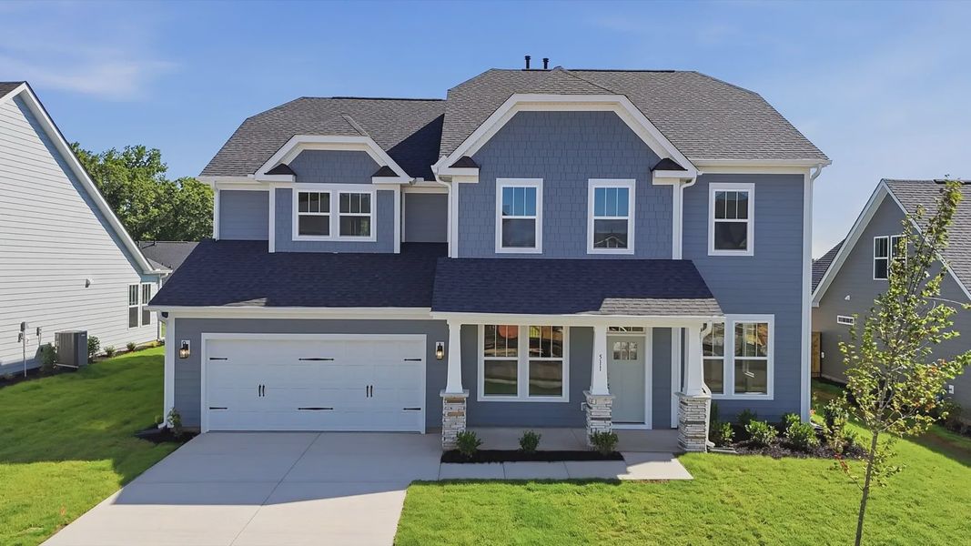 Front exterior of a new home in Kayfield at Midway, Anderson, SC, highlighting curb appeal (Image 1). Front exterior of a new home in Kayfield at Midway, Anderson, SC, highlighting curb appeal (Image 1).
