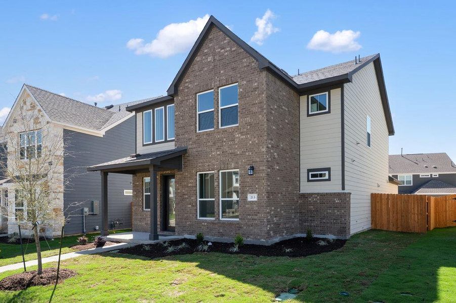 Exterior details and patio area of a home in Lariat, Liberty Hill (Image 3).