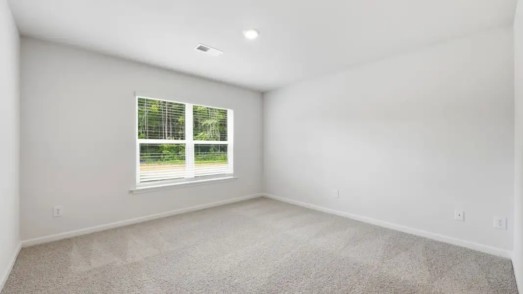 Representative unfurnished interior of a home built from the Freeport II - Express by D.R. Horton in Savannah Place, Wilson (Image 18).