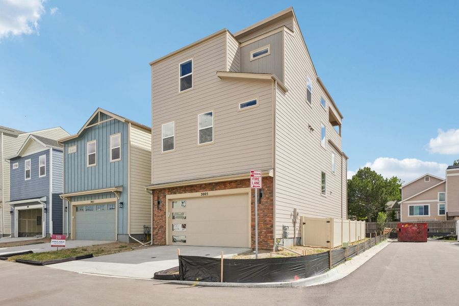 Front exterior of a new home in Pony Park, Colorado Springs, CO, highlighting curb appeal (Image 2). Front exterior of a new home in Pony Park, Colorado Springs, CO, highlighting curb appeal (Image 2).