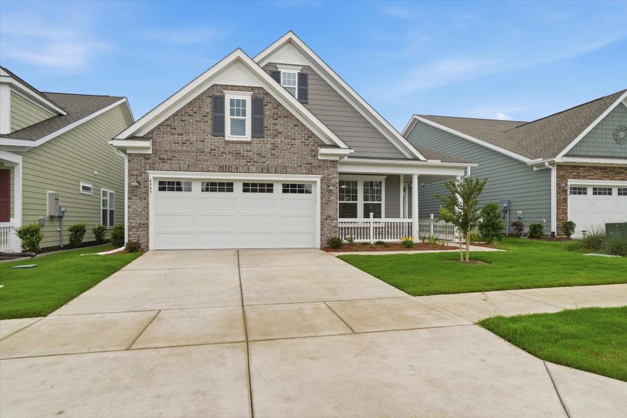 Front exterior of a new home in , Summerville, SC, highlighting curb appeal (Image 20).