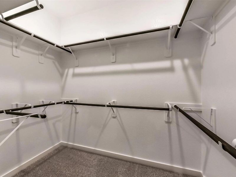 Spacious, unfurnished interior of a new home in Sunterra, Katy (Image 25).