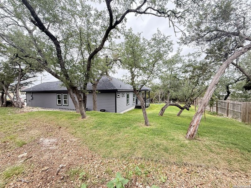Exterior details and patio area of a home in , Spring Branch (Image 25).
