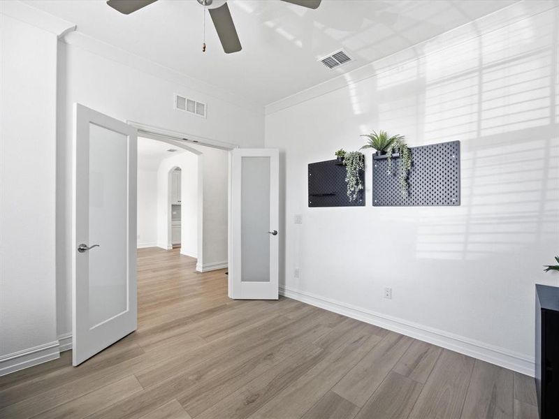 Office view of single story three bedroom home with an office and a formal dining room