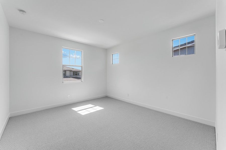 Representative unfurnished interior of a home built from the Denali by Taylor Morrison in Ellsworth Ranch Voyage Collection, Queen Creek (Image 38).