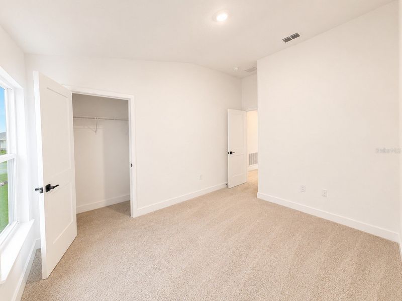 Spacious, unfurnished interior of a new home in Harmony Central, St. Cloud (Image 14).