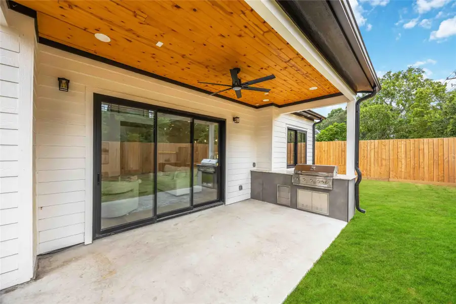 Exterior details and patio area of a home in , Houston (Image 4).