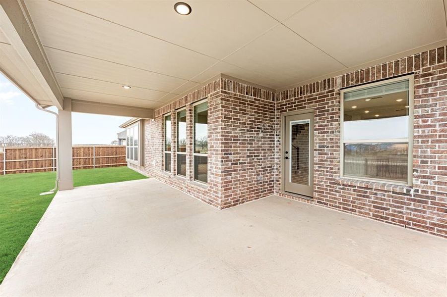 Exterior details and patio area of a home in Silo Mills, Joshua (Image 3).