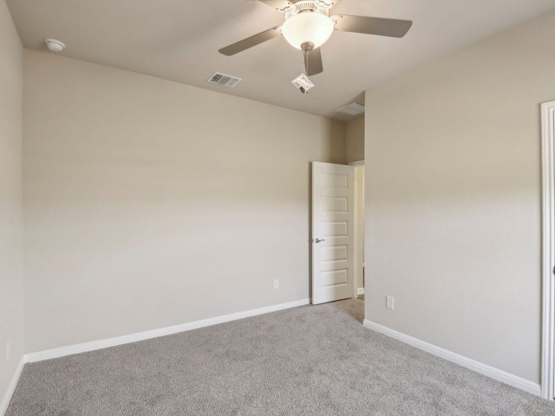 Two of the secondary bedrooms are next to each other with a bathroom in between.