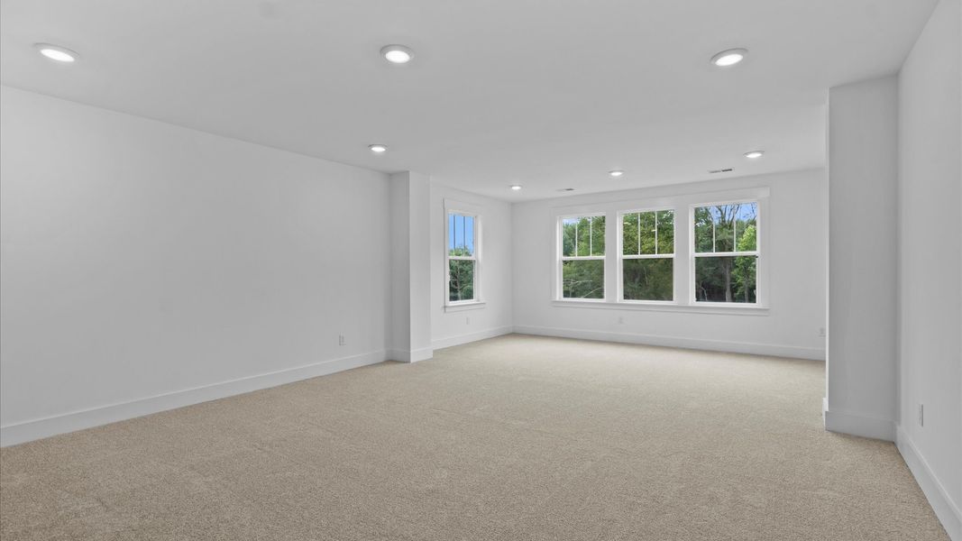 Accomplished design meets restful elegance in this exclusive primary suite by DRB Homes