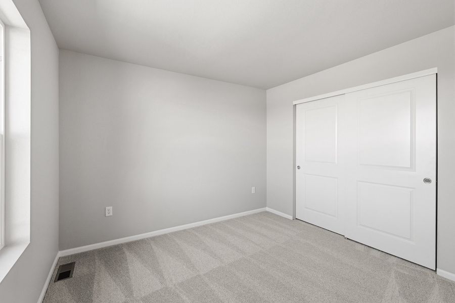 Spacious, unfurnished interior of a new home in Talon Pointe, Thornton (Image 19).
