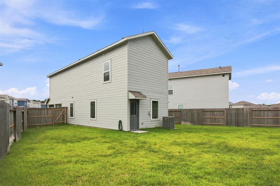 Exterior details and patio area of a home in Tavola, New Caney (Image 4).