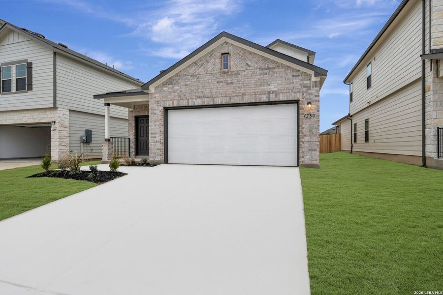 Front exterior of a new home in Park Place, New Braunfels, TX, highlighting curb appeal (Image 22).
