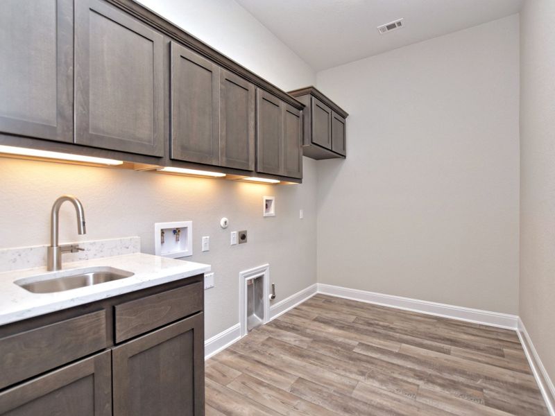 Representative furnished interior of a home built from the Siena III by Giddens Homes in Clearwater Ranch, Liberty Hill (Image 143).