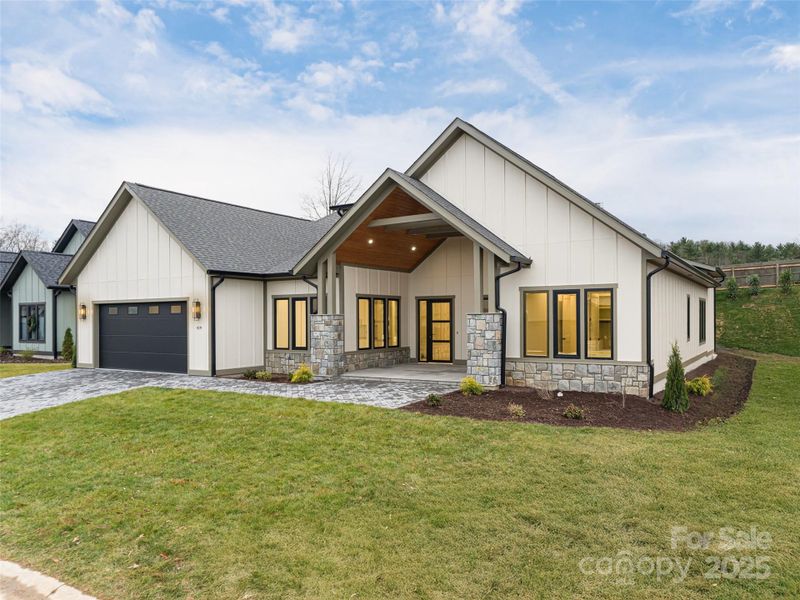 Front exterior of a new home in , Arden, NC, highlighting curb appeal (Image 2).