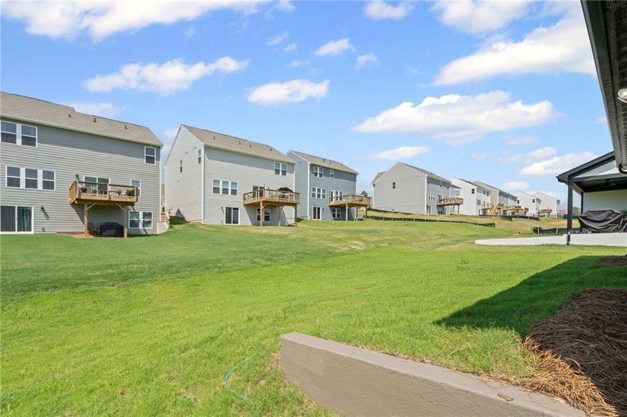 Front exterior of a new home in Twin Lakes, Hoschton, GA, highlighting curb appeal (Image 20).