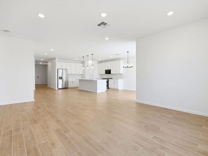 Spacious, unfurnished interior of a new home in Blossom Rock Reserve Series, Apache Junction (Image 10).