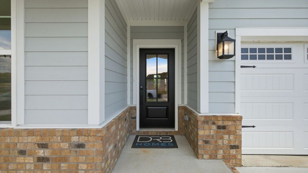 Front Entryway from exterior of home with black door